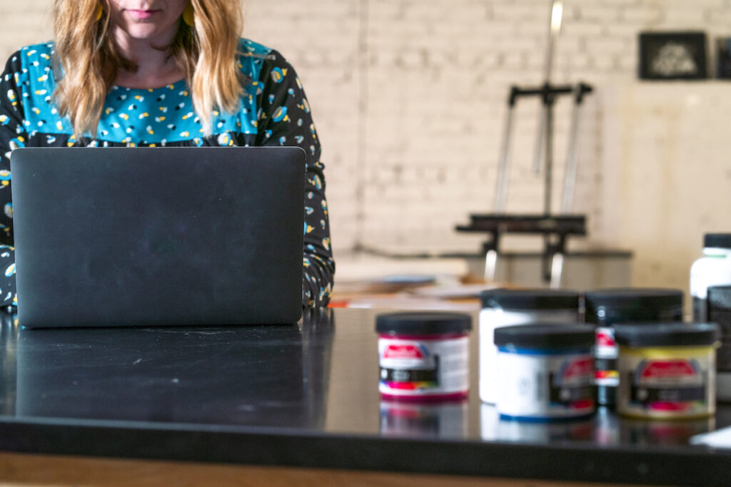 woman looking at computer