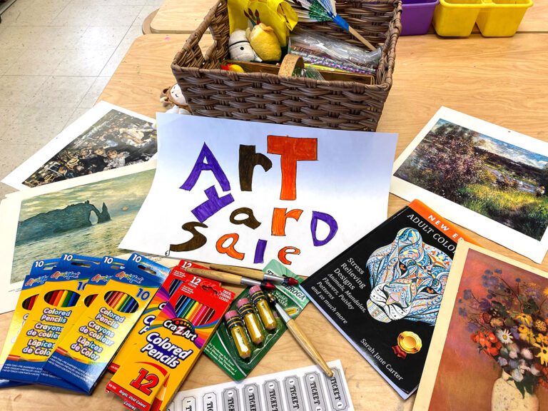 art yard sale sign and items