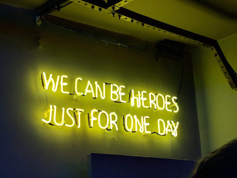 yellow lights that spell out we can be heroes just for one day