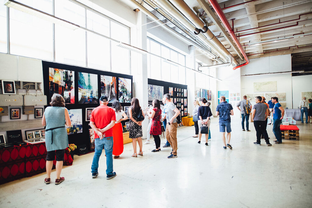 people viewing artwork