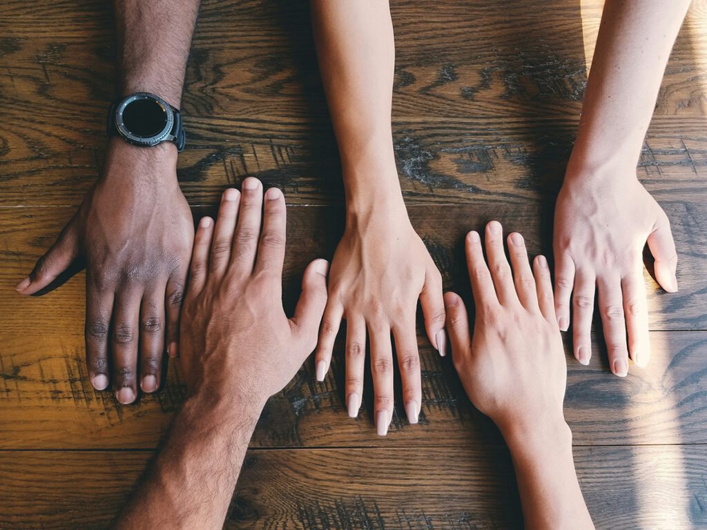 line of hands