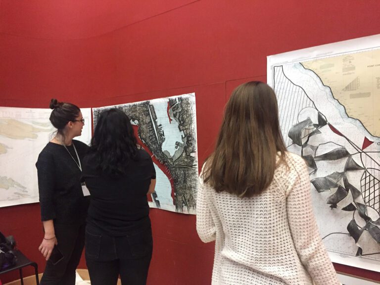 students looking at art