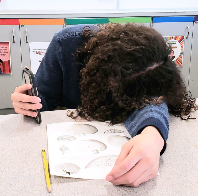 student on phone