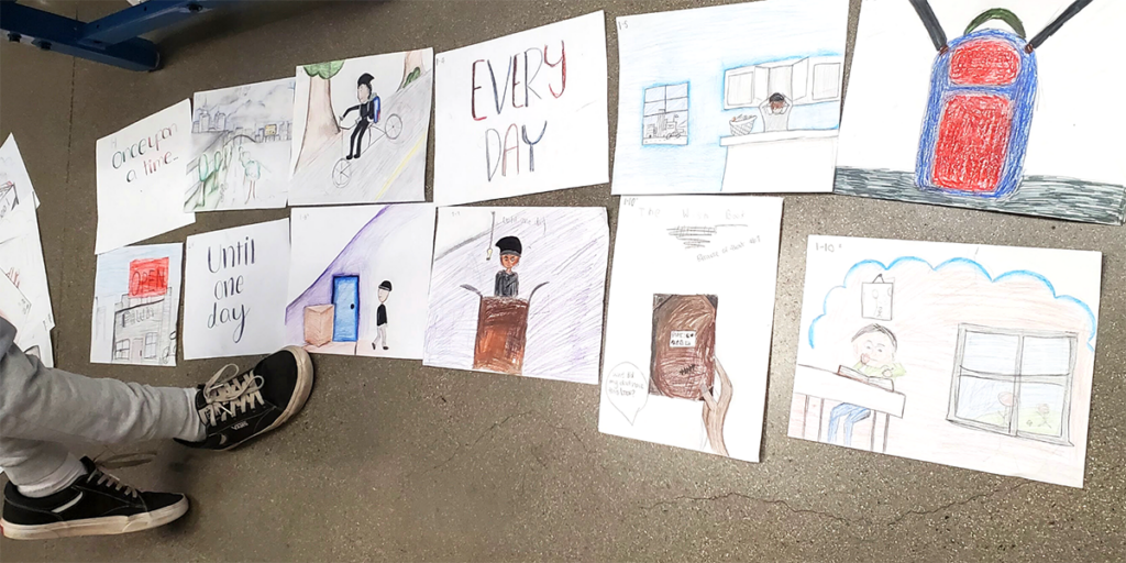 storyboarding with drawings on the floor